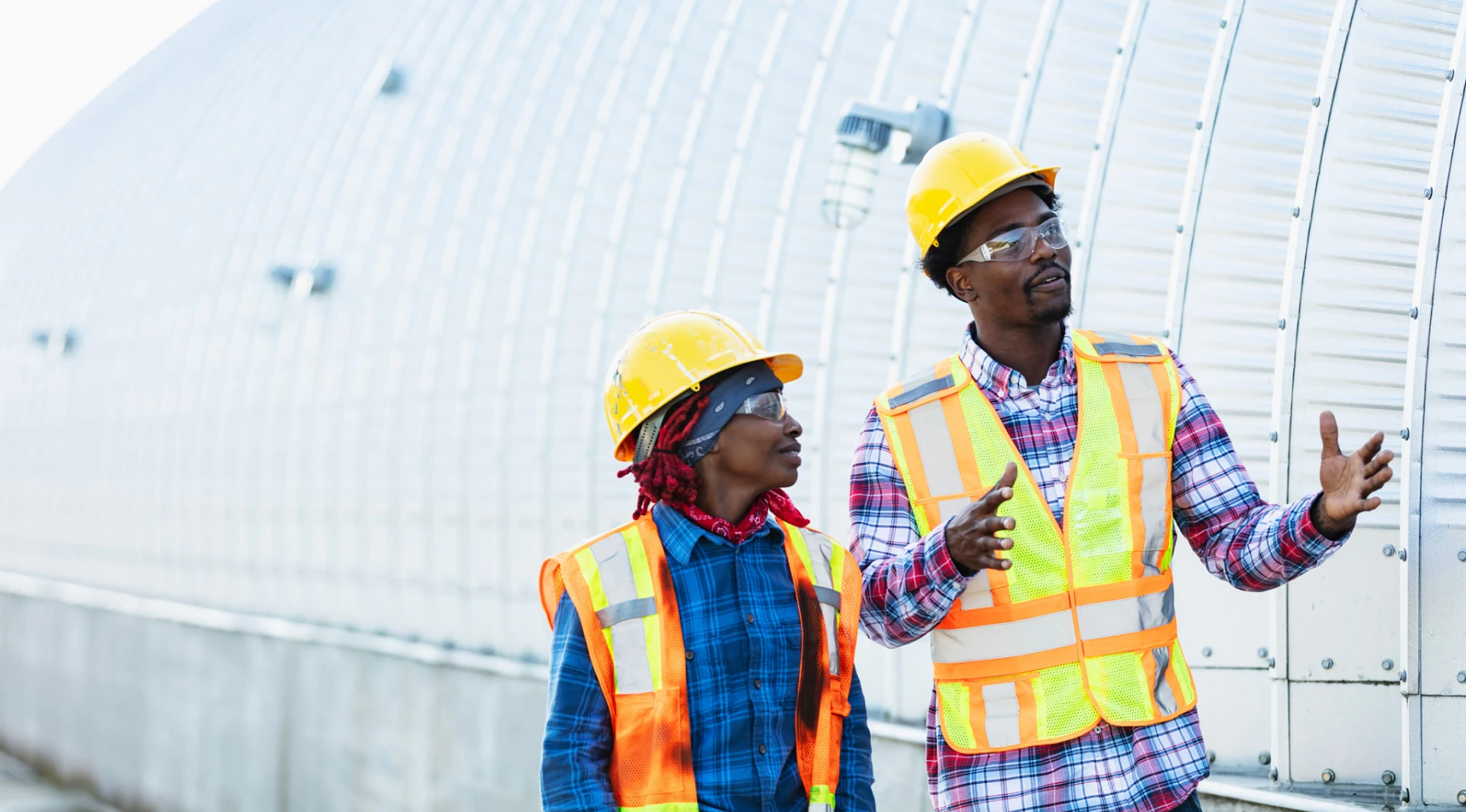 Construction workers discussing project plans