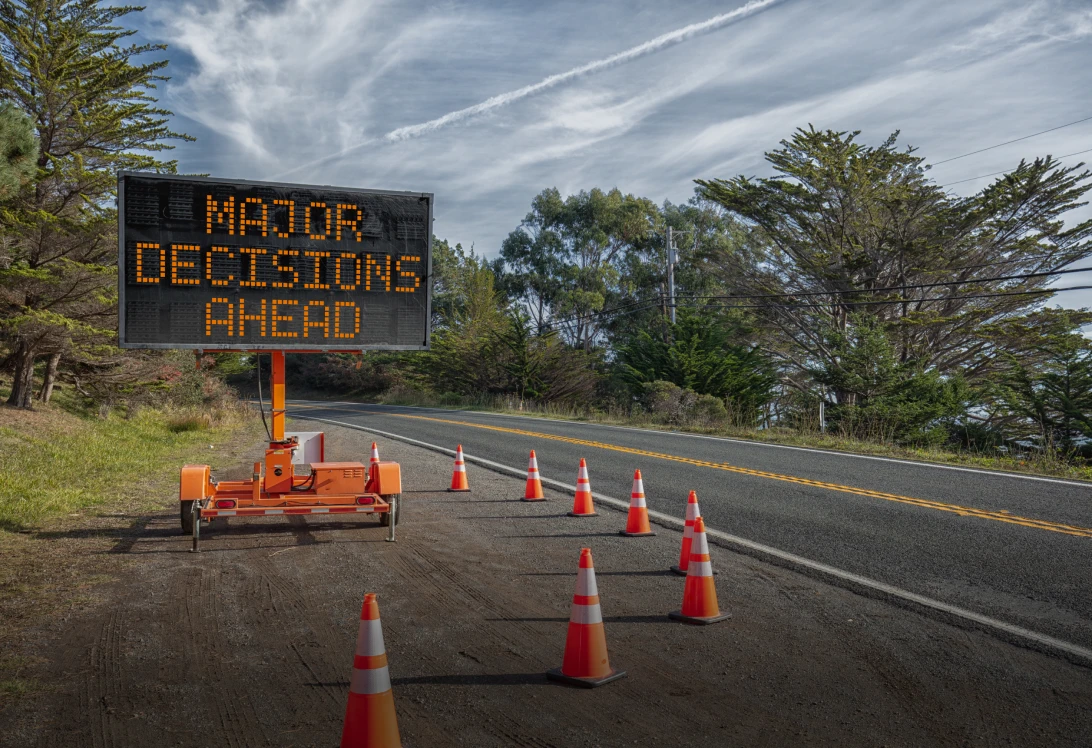 Caution sign on scenic roadside